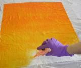 Dyeing fabric in a gradient from yellow to orange'