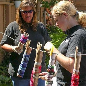 Wrapping wet fabric on tubes for dyeing
